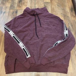 Long sleeve Pink shirt, has a turtle neck on it but it lays like a scarf